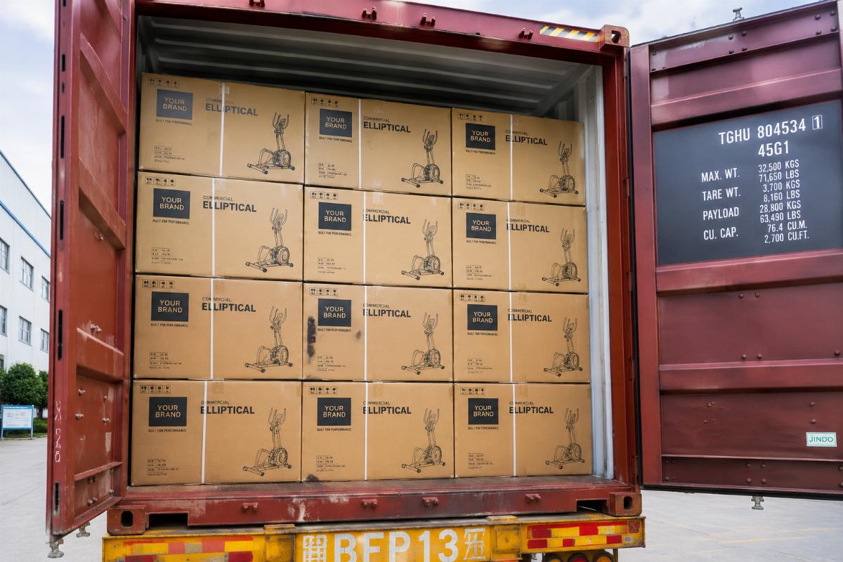 Full 40HQ container of branded commercial ellipticals ready for shipping